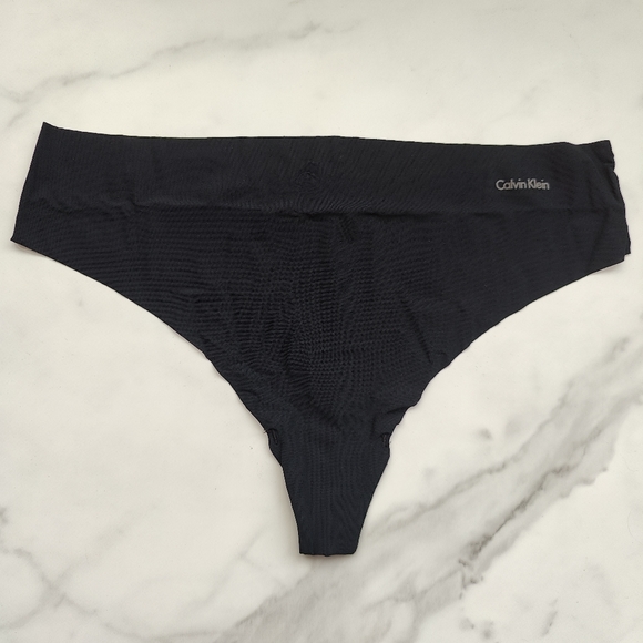 NWOT CALVIN KLEIN INVISIBLES THONG PANTY IN CK BLACK SIZE EXTRA LARGE - Picture 1 of 4